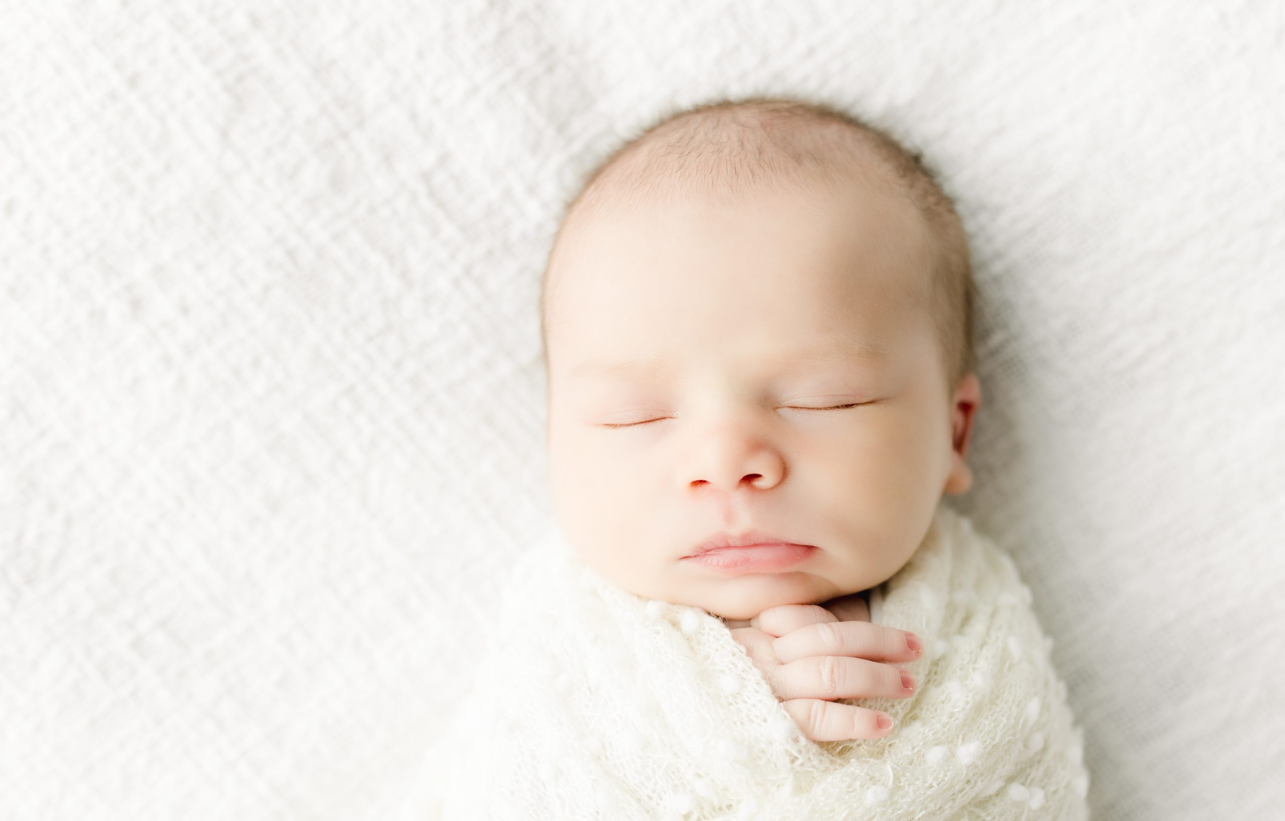 portrait of a newborn baby by DC Newborn Photographer