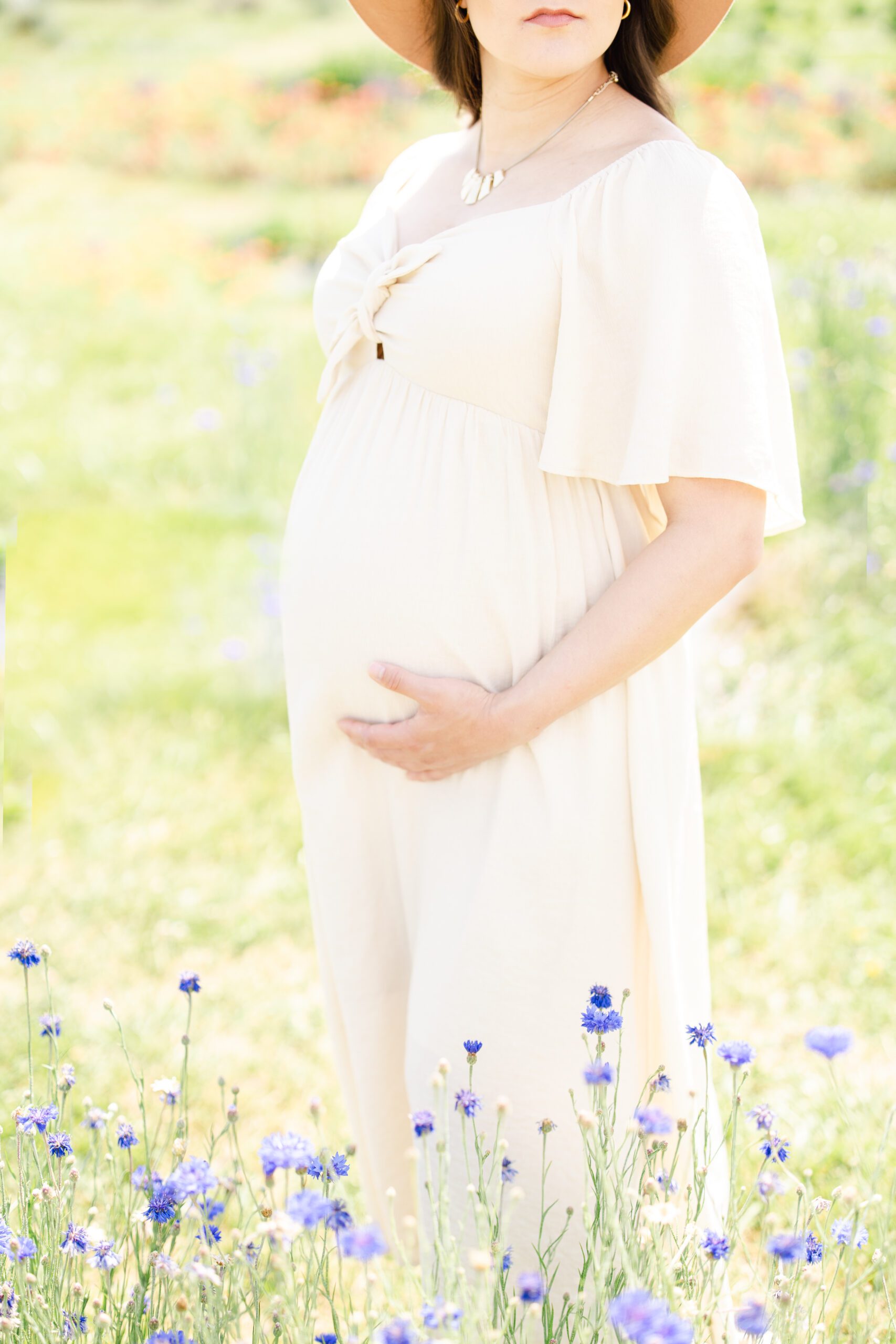 portrait of pregnant mom-to-be at her Lavender Maternity Shoot