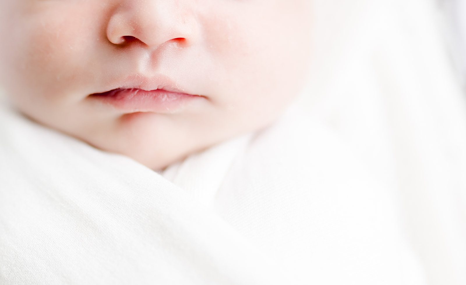 Detail shot of a newborn baby's lips and nose by northern virginia newborn photographer